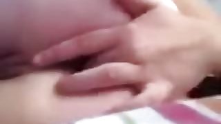 Teen fingers her ass